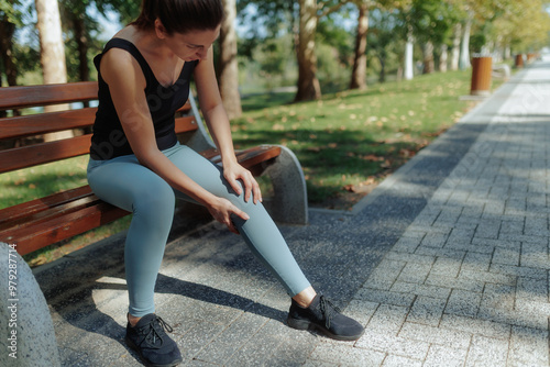 Young Brunette Woman Exercising and Training in the Park on a Beautiful, Sunny Day