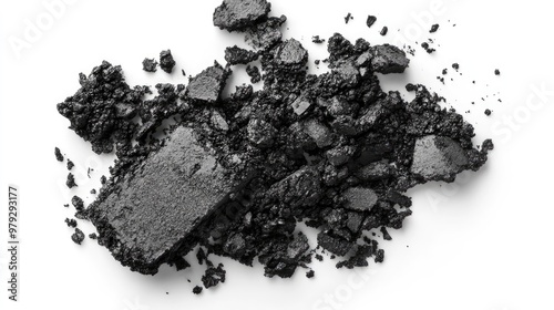 Black eyeshadow scattered on white background. Ideal for beauty, fashion, and cosmetic advertising.