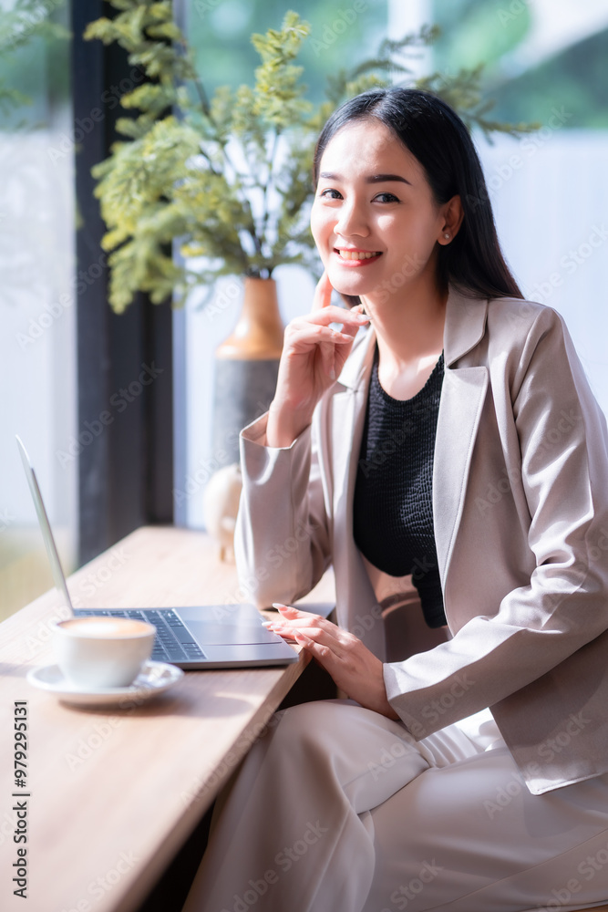 asian freelance people business female talking making using casual working with laptop computer for browsing internet, chatting and blogging and smartphone,notebook in coffee shop.