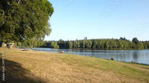 The Ponty pond, near Ussel in Aveyron, is located at the foot of the Millevaches plateau, popular for fishing and walking, it is surrounded by forests and is home to ducks, moorhens and water lilie photo