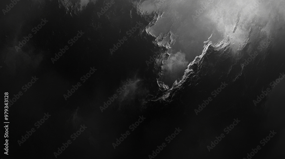 Fototapeta premium A dark gradient moving from shadowy gray to deep obsidian black, with subtle highlights adding a sense of mystery.