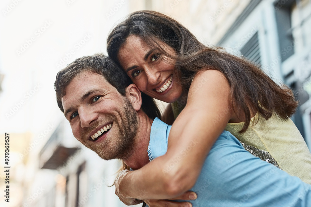 Obraz premium Couple, portrait and piggyback in city on holiday, marriage commitment and travel to Greece. People, outdoor and support for security in relationship, adventure and play on honeymoon weekend trip
