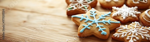 Decorative Christmas cookies shaped like snowflakes, beautifully iced and perfect for holiday celebrations and festive gatherings.