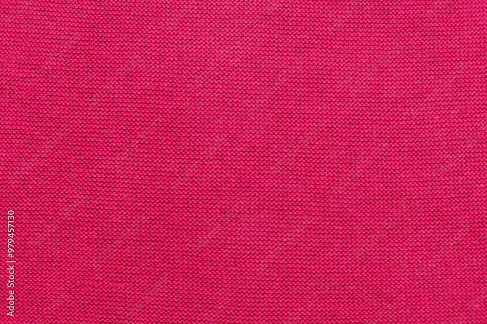 Fototapeta premium Knitted fabric fuchsia, dark pink, yarn. Creativity as a way to relax.