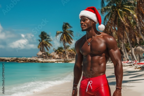 black man wearing santas hat and red swimshorts palm trees in the background  photo