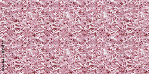 shredded paper filler in dusty dusty pink color with thin, delicate strips photo