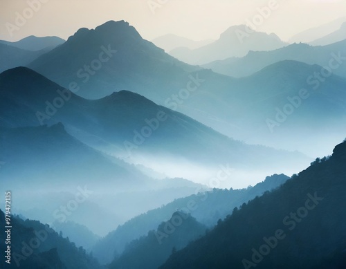 Misty Mountains at Dawn, Shrouded in Fog and Illuminated by Soft Light