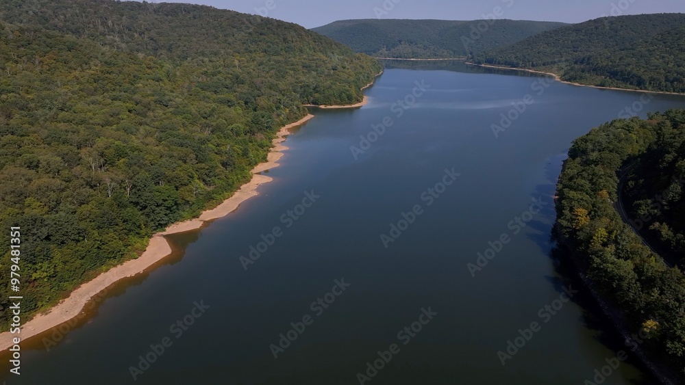 Peaceful calm water beautiful lake reservoir in mountain wilderness in Allegheny Forest in Pennsylvania for camping and hiking in nature Peaceful calm water beautiful lake reservoir in mountain wilderness in Allegheny Forest in Pennsylvania for camping and hiking in nature