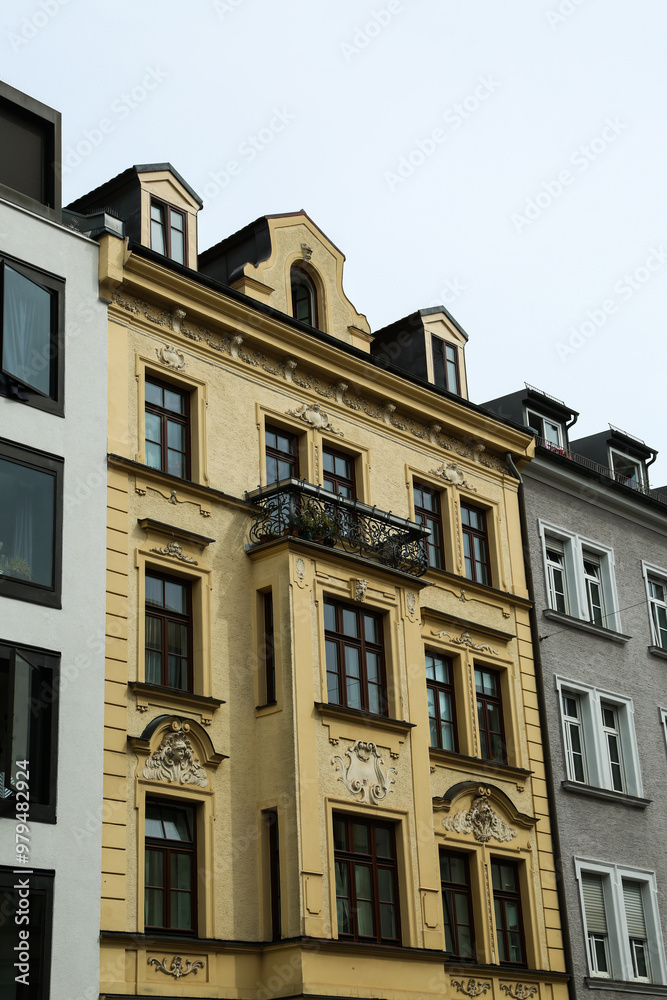 Residential building in Munich, old building and new building next to each other Residential building in Munich, old building and new building next to each other