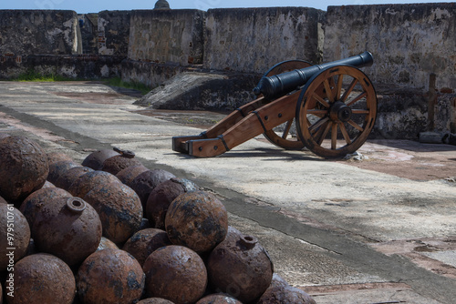old cannon and cannon balls in Castillo San Felipe del Morro fortress, San Juan, Puerto Rico photo