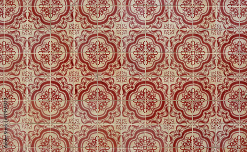 Azulejos, traditional Portuguese ceramic tiles on house wall, pattern background in red and beige