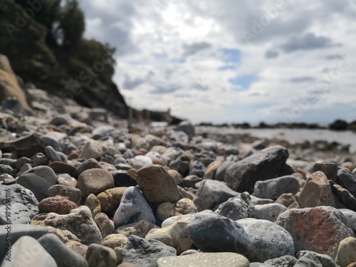Photo of the stony beach near Livorno in Italy