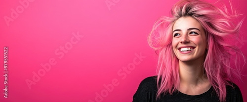 Young pretty woman smiling with pink waving hair on color background with copy space, bright hair dye, direct pigment banner template