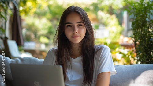 A Woman Enjoying Summer Day on Garden Sofa, Laptop on Modern Terrace, Relaxing Outdoors at Home or Resort Free Download A Woman Enjoying Summer Day on Garden Sofa, Laptop on Modern Terrace, Relaxing Outdoors at Home or Resort - GFXLoad
