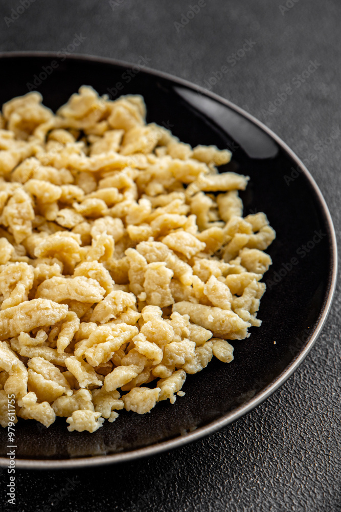 spaetzle egg pasta irregular shape fresh meal food snack on the table copy space food background rustic top view spaetzle egg pasta irregular shape fresh meal food snack on the table copy space food background rustic top view