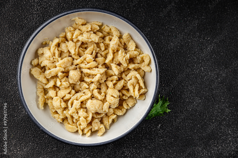 spaetzle egg pasta irregular shape fresh meal food snack on the table copy space food background rustic top view spaetzle egg pasta irregular shape fresh meal food snack on the table copy space food background rustic top view