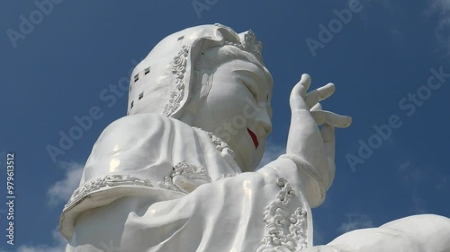 Asian Buddhist Temple. Goddess of Mercy (Guan Yim) in Wat Huay Pla Kang, Chiang Rai, Thailand. It attracts many tourists to visit the place. photo