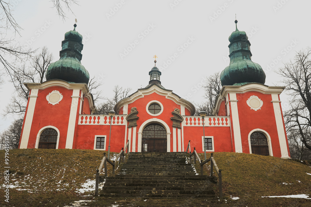 Obraz premium Discover the unique architecture of the Calvary in Banska Stiavnica, Slovakia, set against a winter landscape with historical significance