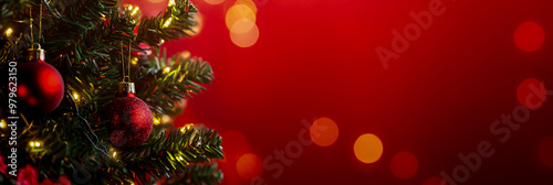 Christmas tree with toys on a red background, banner design, space for text, close-up, photo