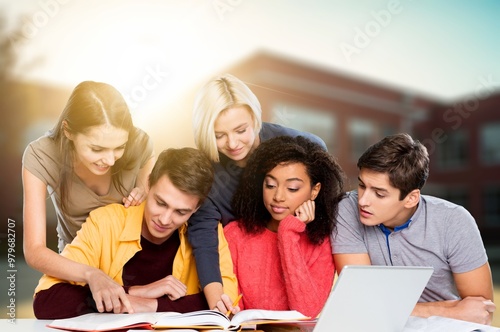 Group off cheerful college students at a campus park.