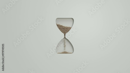 an hourglass that turns indefinitely to symbolize the passing of time - loop - 4K