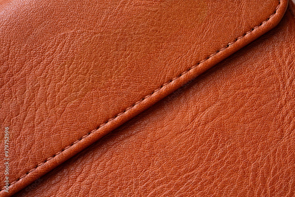 Brown macro synthetic leather,Synthetic leather brown background texture. Brown leather textured background. Brown macro synthetic leather,Synthetic leather brown background texture. Brown leather textured background.