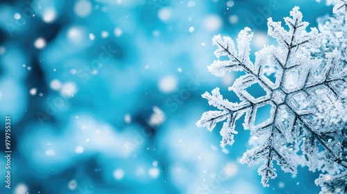 A close-up of a delicate snowflake on a soft blue background, capturing the beauty and uniqueness of winter's frost.