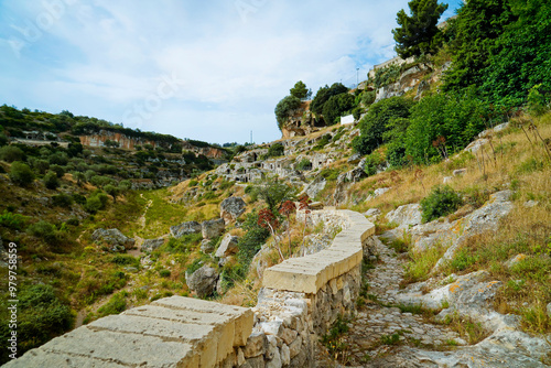 Il nucleo antico di Ginosa caratterizzato dalla gravina con antiche case e chiese rupestri, Taranto, Puglia, Italia photo