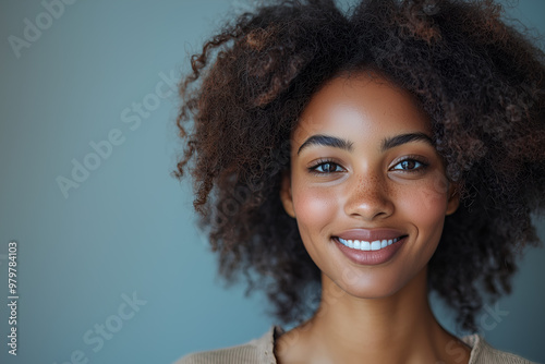 Portrait of a Smiling Woman with Curly Hair