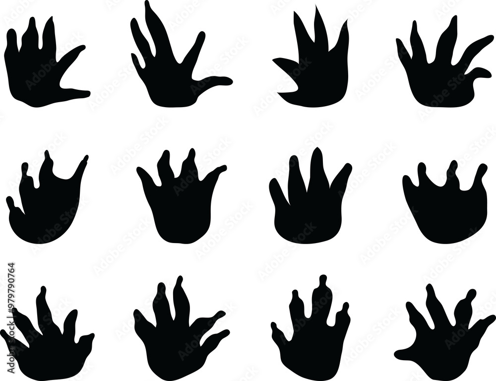 Fototapeta premium Black footprints of crocodiles 