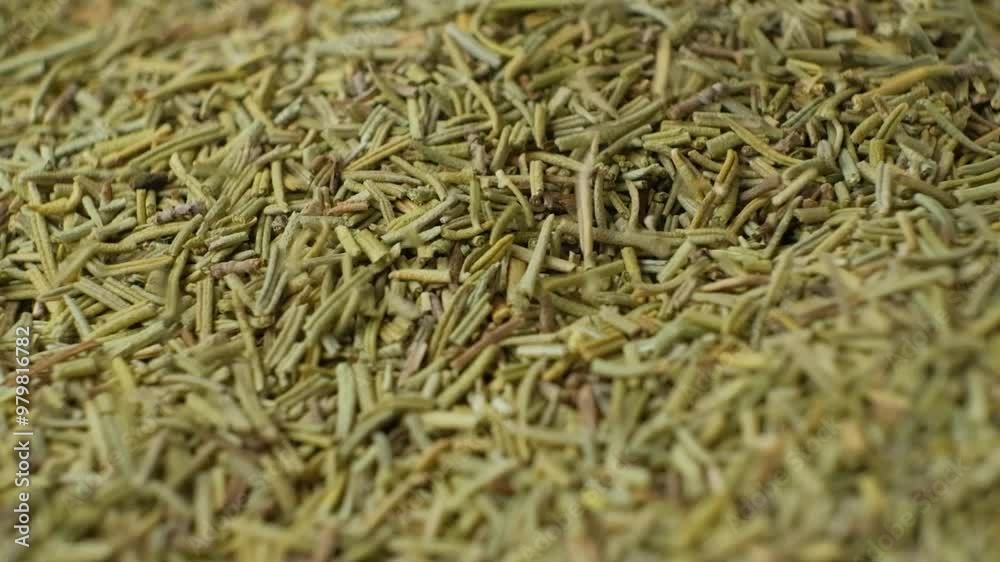 Spice rosemary pours macro slow motion Spice rosemary pours macro slow motion