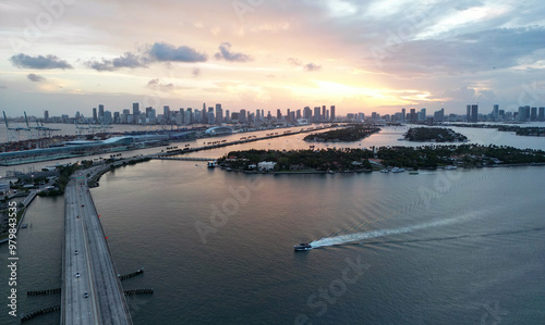 Miami Beach, South Beach at night. Miami seaside at dusk. Aerial view of evening Miami Beach and cityscape. Coastline of Miami Beach night shot from the air drone.