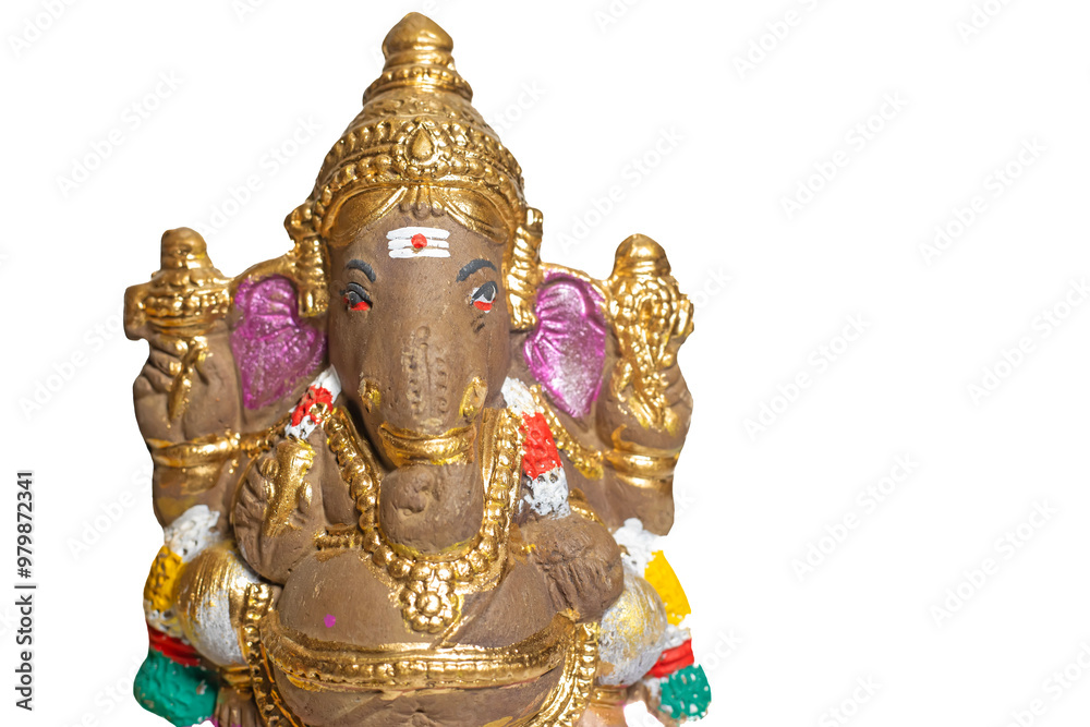 Fototapeta premium Ganesha idol made of painted clay on white background.