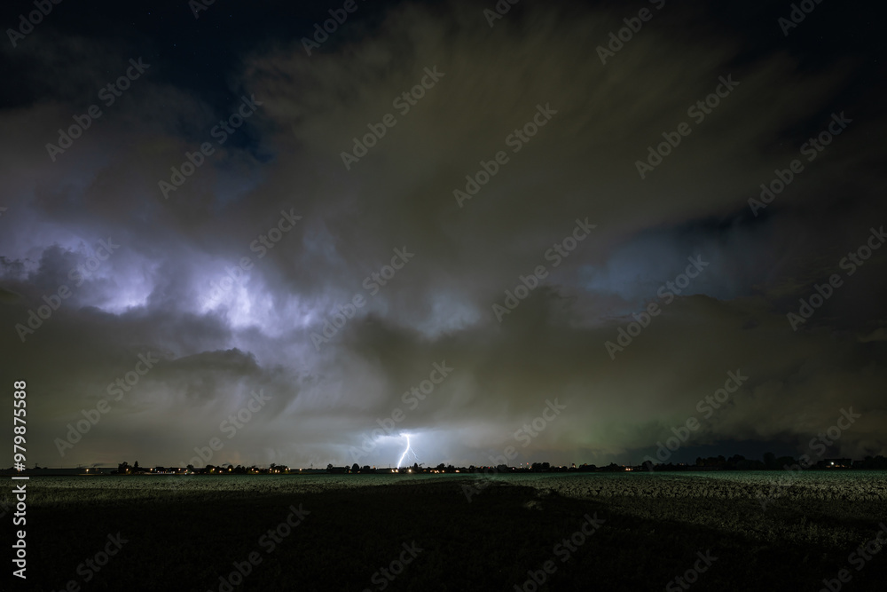 Distant lightning bolt from an autumn coastal thunderstorm in The Netherlands Distant lightning bolt from an autumn coastal thunderstorm in The Netherlands