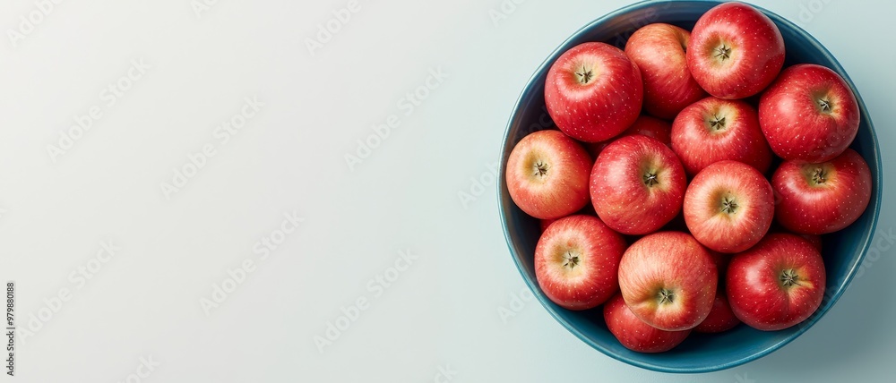 Overhead Abundance Red Apples in a Blue Bowl Overhead Abundance Red Apples in a Blue Bowl