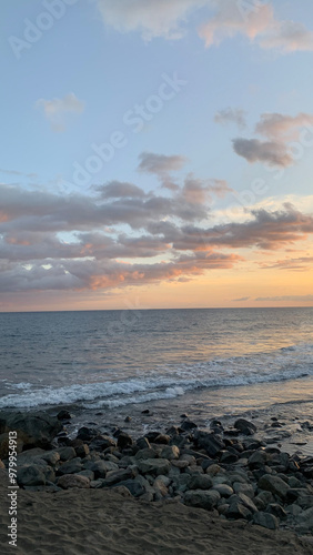 Sunset Over Calm Ocean Waves