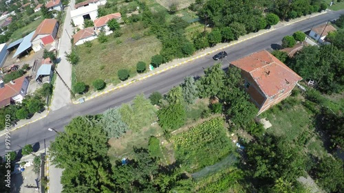 Aerial view of a car driving through the village road. Sarilar Village Thrace Region, Turkey Country
 photo