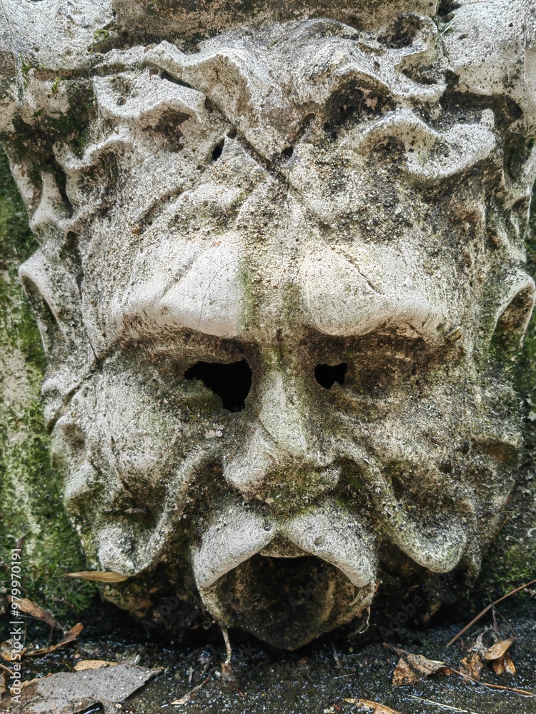 Close up of a man face statue in stone. Close up of a man face statue in stone.
