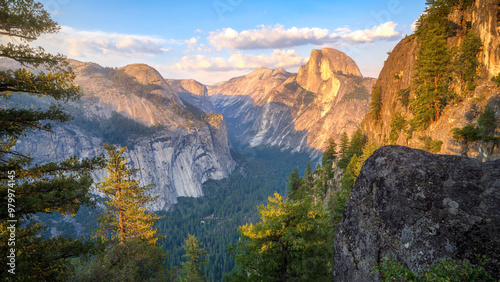 Obraz na płótnie hiking the four mile trail at sunset in yosemite national park, california w salonie