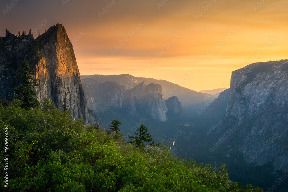 hiking the four mile trail at sunset in yosemite national park, california