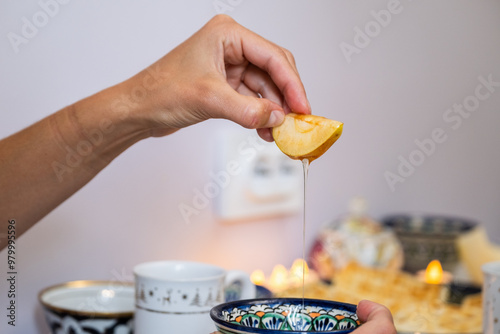 jewish family celebrating hanukkah, israel, jewish holidays, yom kippur feast, table with food, honey, donuts, family holiday photo