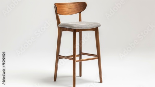 a modern wooden bar stool with a cushioned seat photo