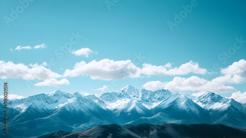 Snow-capped mountains under a clear sky.