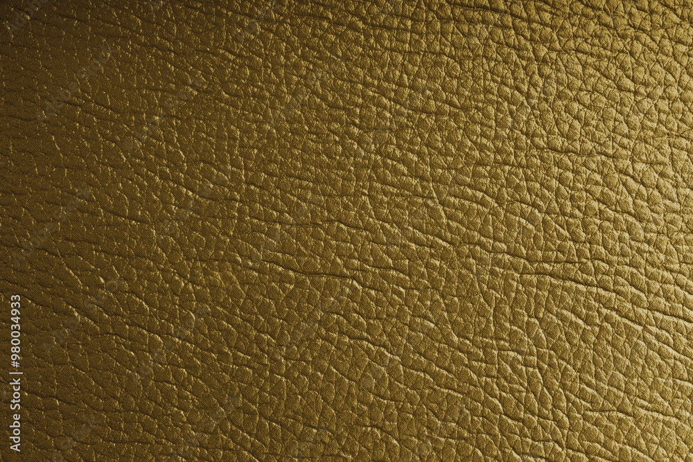 Natural, genuine yellow leather with metallic effect, texture of glossy leatherette background
