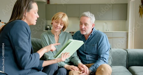 Wallpaper Mural Mature Couple Meeting with Financial advisor, looking at Digital tablet and Handshake Torontodigital.ca