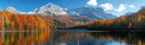 Majestic Autumn Mountain Landscape with Vibrant Foliage and Serene Lake