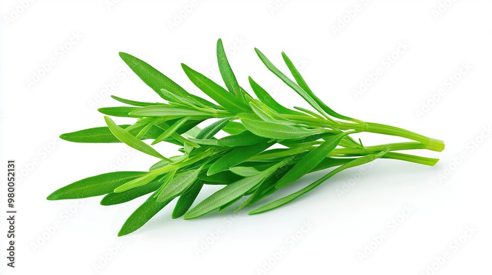 A white table with a bottle of orange juice next to green leaves A white table with a bottle of orange juice next to green leaves