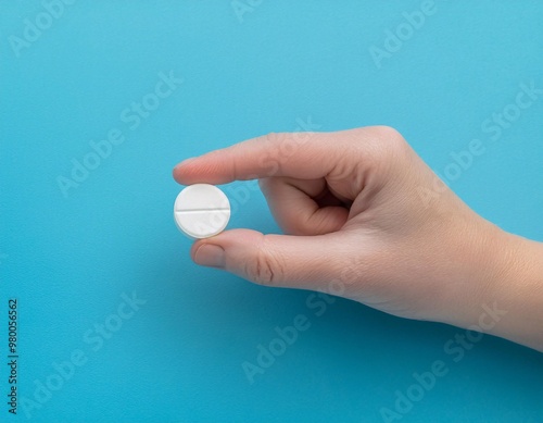 hand holding pills or medicine on a neutral background. generative ai photo