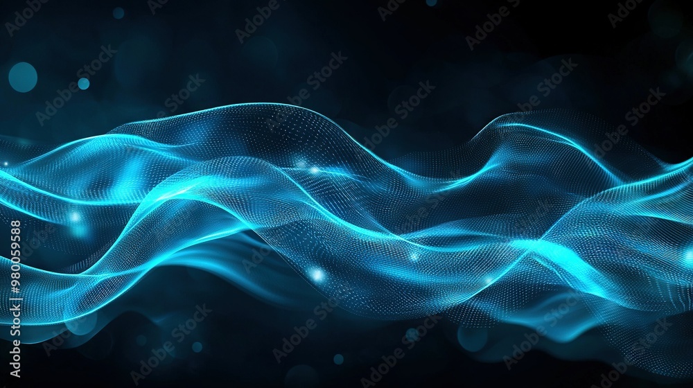 A blue wave of light on a black background with a blurred top light source A blue wave of light on a black background with a blurred top light source