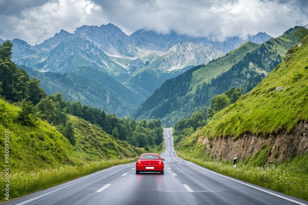 Red car driving on nature road between green mountains in summer. Nature landscape on highway for summer vacation travel. Mountain road view on beautiful nature trip in Europe. car drive highway, ai Red car driving on nature road between green mountains in summer. Nature landscape on highway for summer vacation travel. Mountain road view on beautiful nature trip in Europe. car drive highway, ai